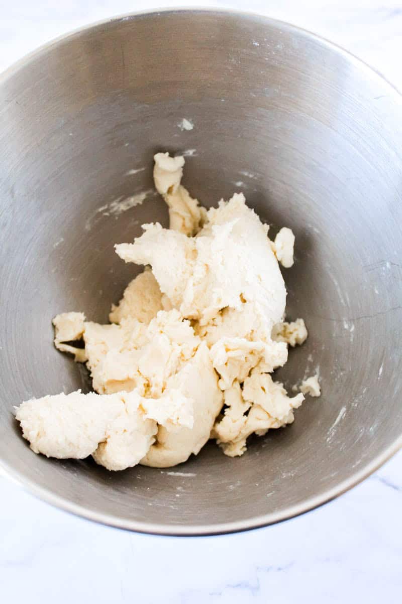 Made dough in metal bowl.