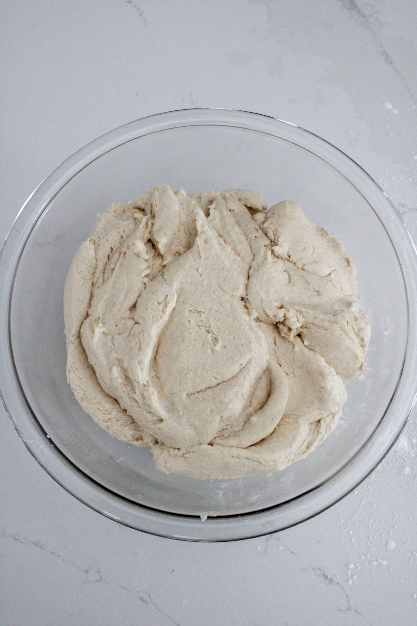 Dough in bowl set to rise.