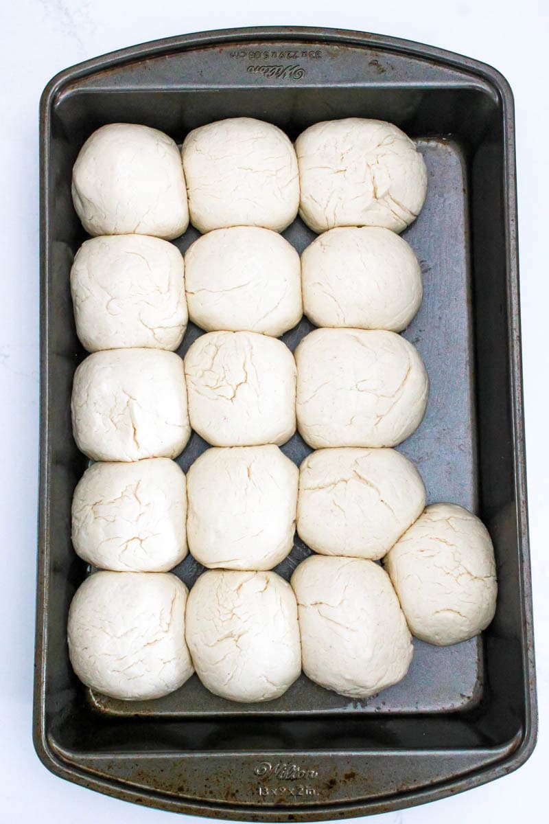Dough set in baking pan set for second rise.