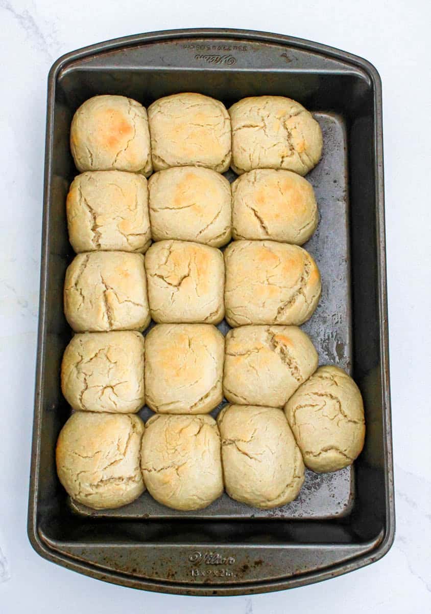 Baked dinner rolls with melted butter on top