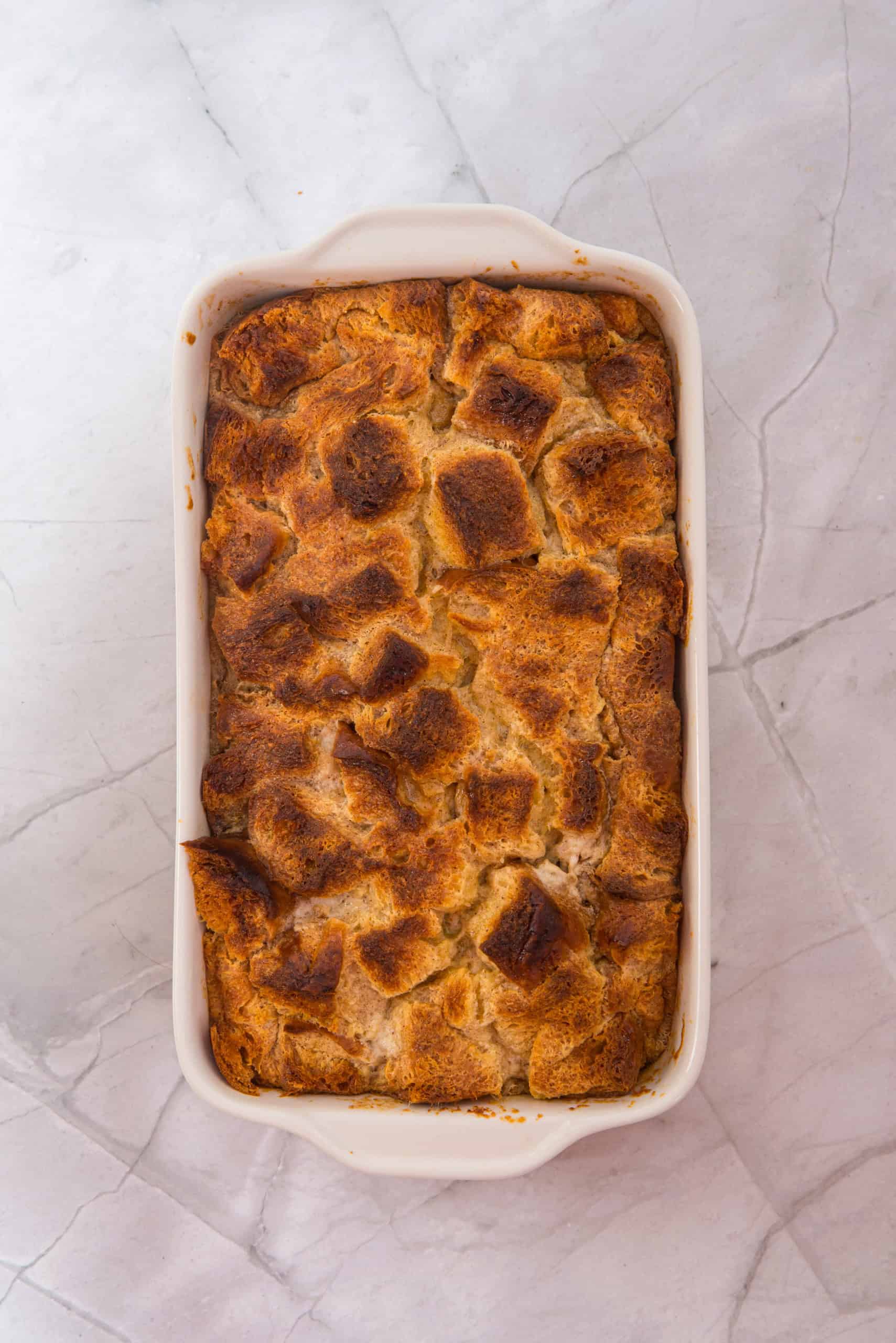 Baked gluten free eggnog french toast casserole in baking dish