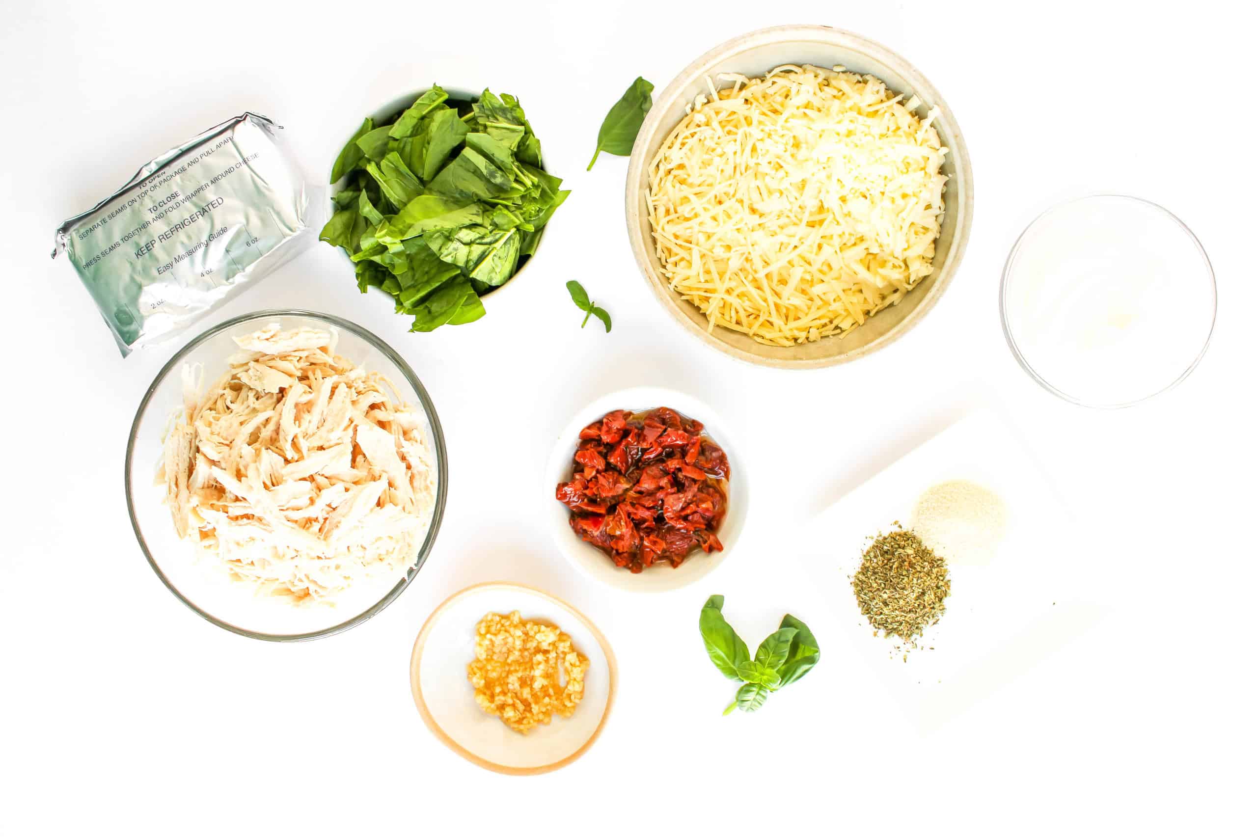 Ingredients for Marry Me Chicken Dip on white.