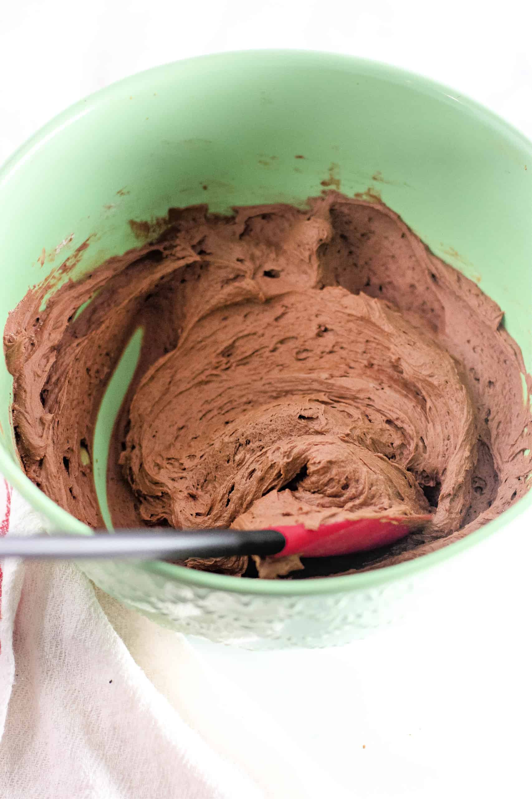 The frosting made in a bowl