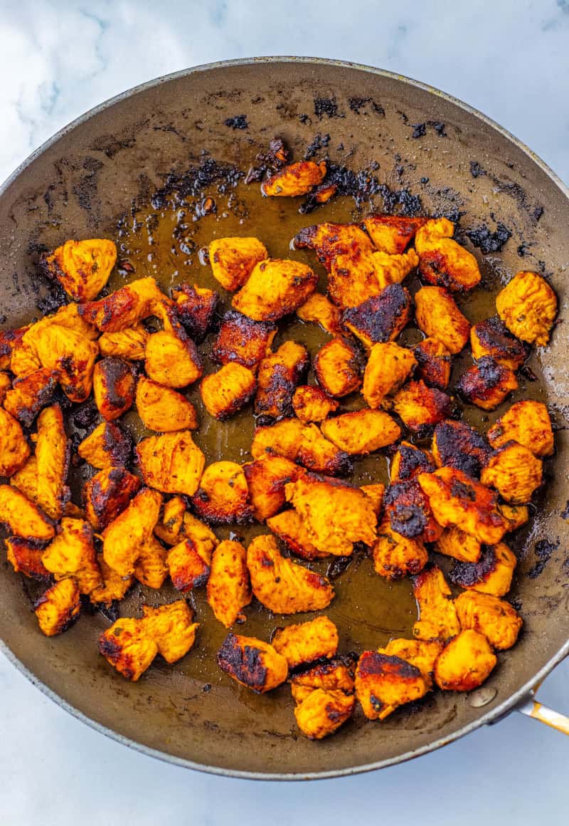 Cooked chicken in a skillet