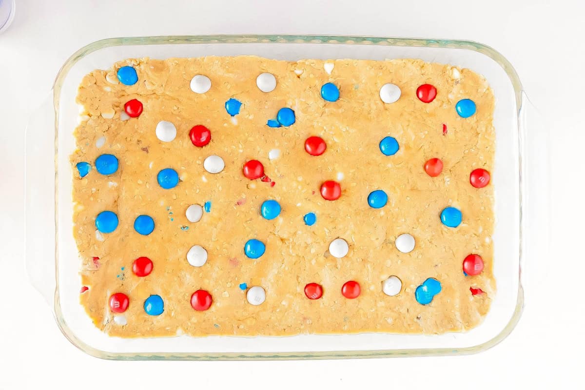 The cookie bar batter in a 9x13 pan.