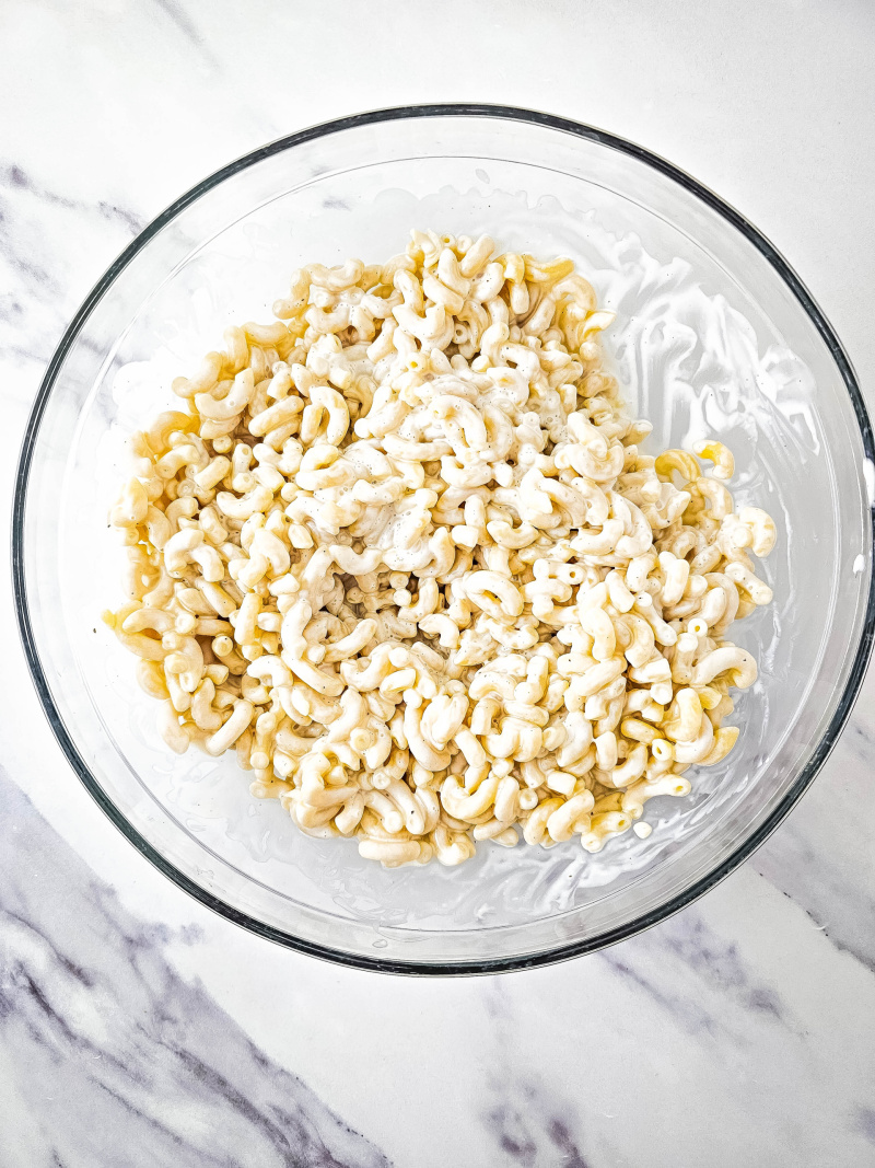 Bowl of macaroni noodles and dressing