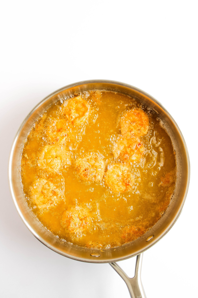 Shrimp frying in frying pan