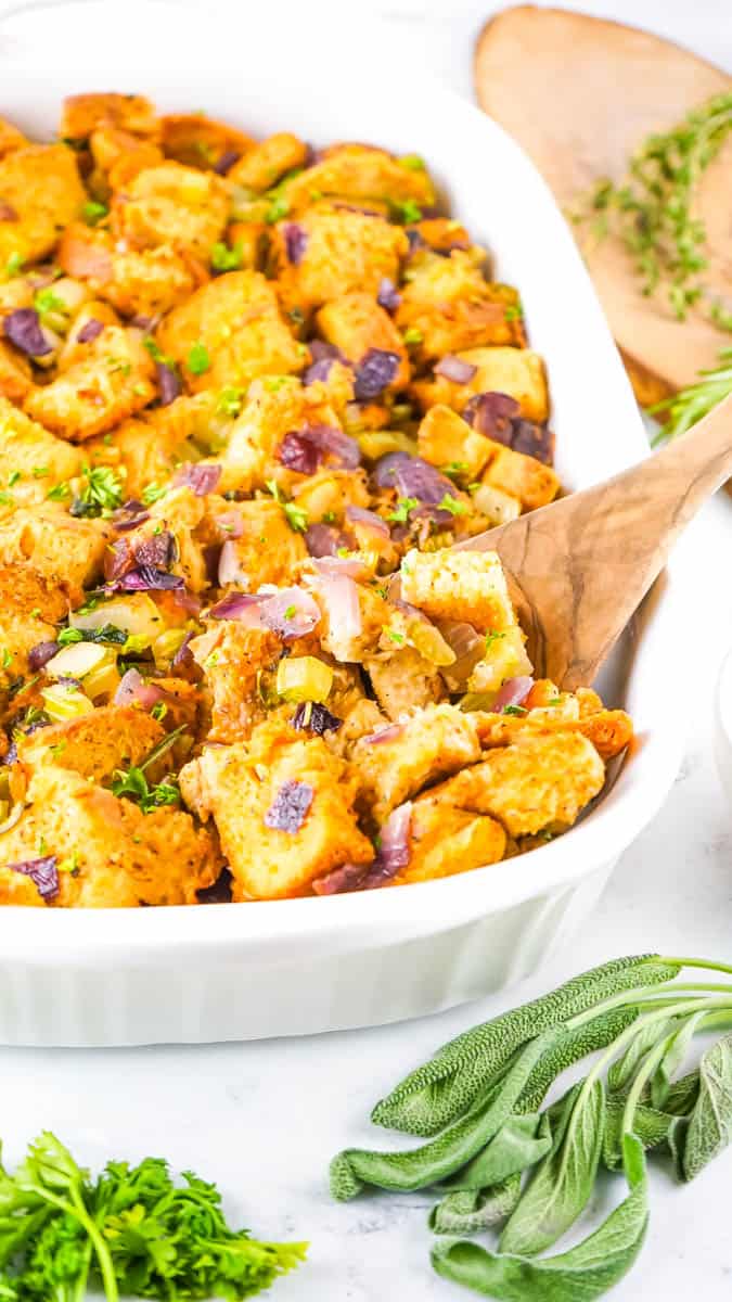 Bowl with stuffing and wooden spoon in bowl