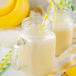 Two glass jars with banana milk