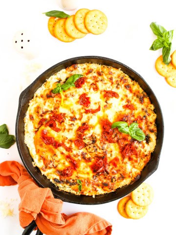 Marry Me Chicken dip in a cast iron skillet.
