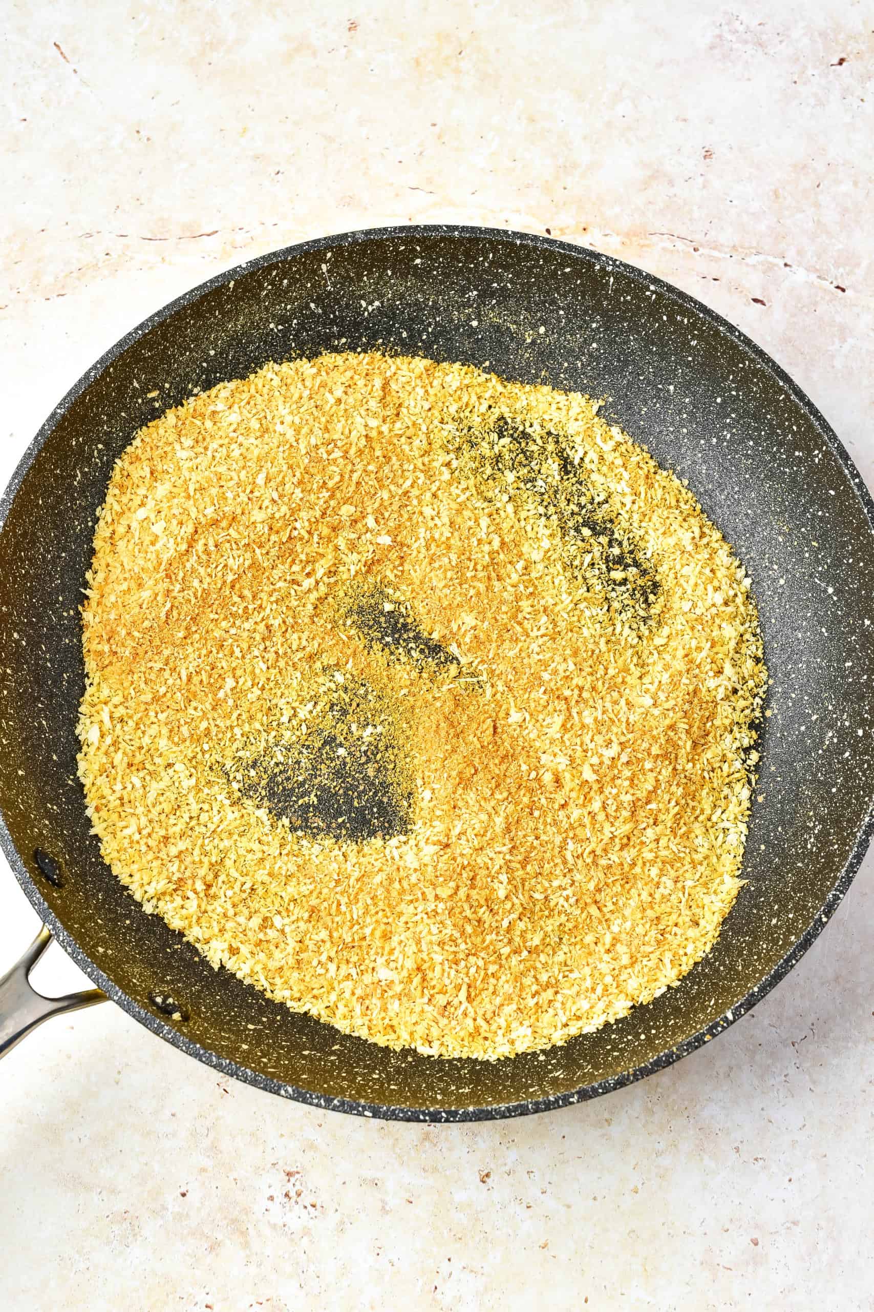 Toasted breadcrumbs in a frying pan