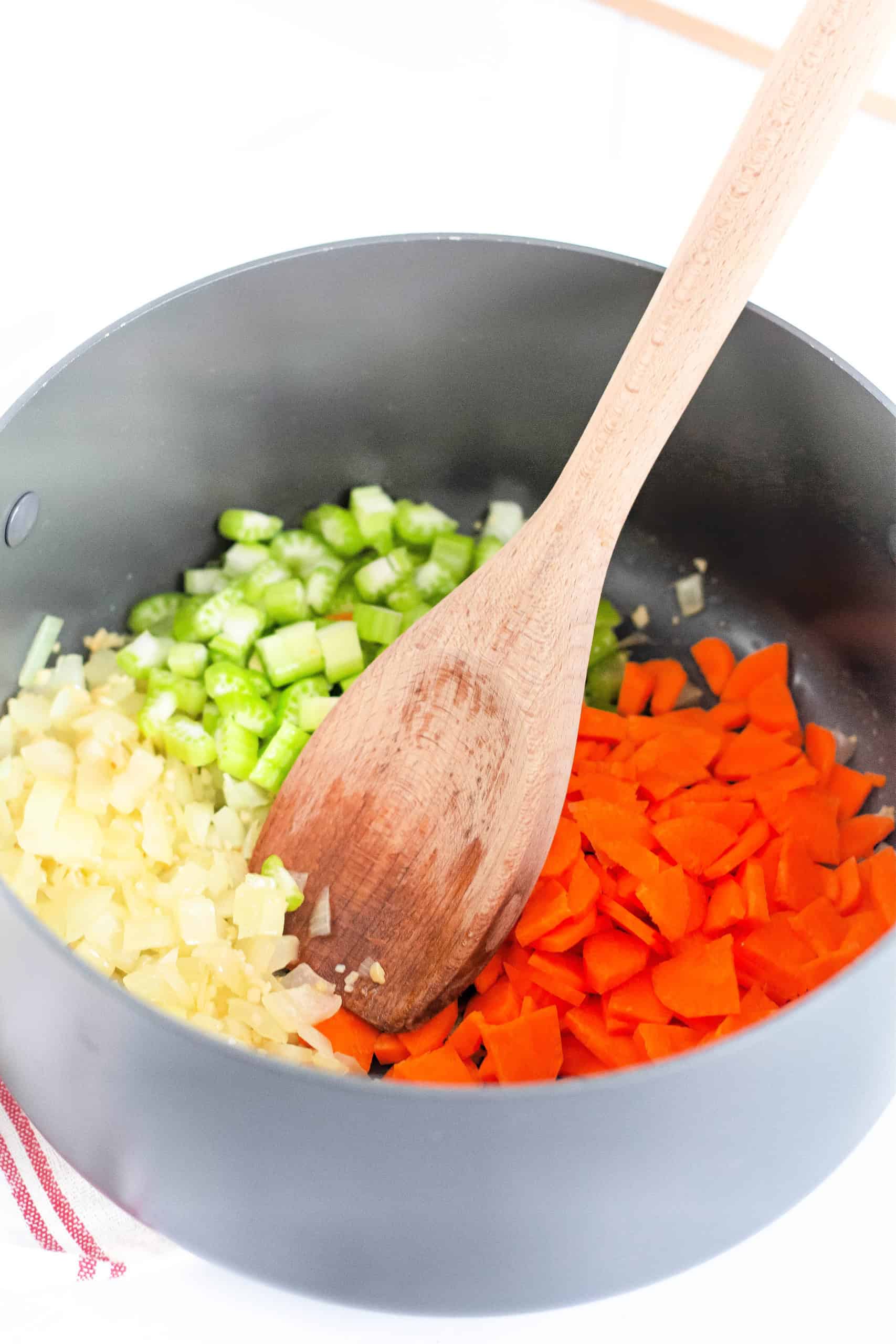 The garlic, onions, carrots and celery cooking in one pot