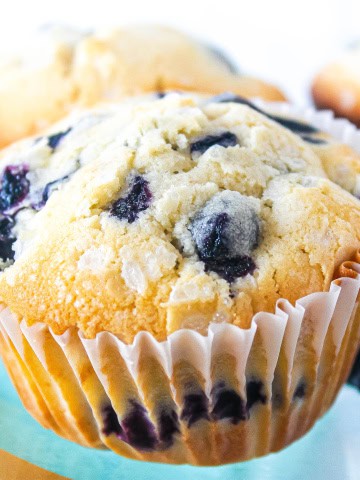 A close up shot of a gluten free blueberry muffin